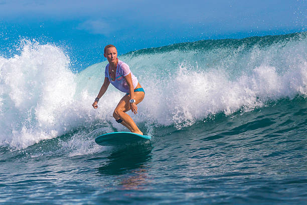 istock Surfer girl on Amazing Blue Wave 537389321