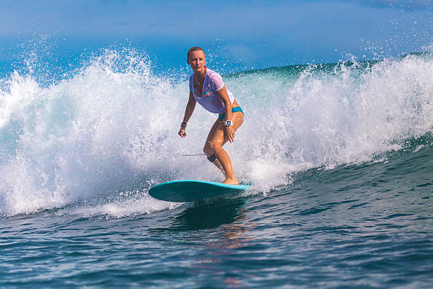istock Surfer girl on Amazing Blue Wave 537389329