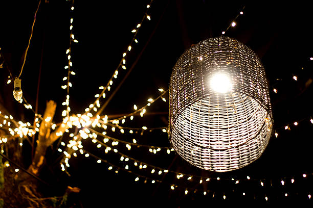 istock lamp decoration garden on tree at night time 537389424