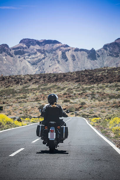 istock couple on a motorcycle traveling 537389590