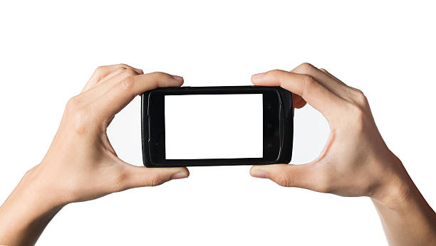 istock smart phone, in hand isolated on white 537389603