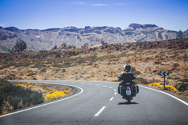 istock couple on a motorcycle traveling 537389652