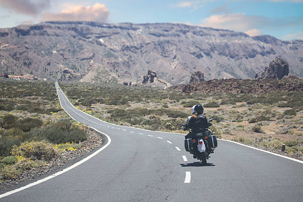 istock couple on a motorcycle traveling 537389784