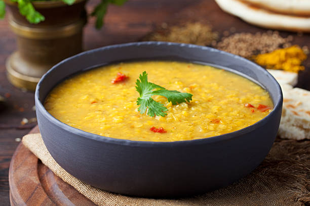 istock Red lentil Indian soup with flat bread Masoor dal 537392232