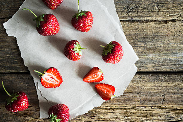istock fresh strawberries on a wooden background 537393048