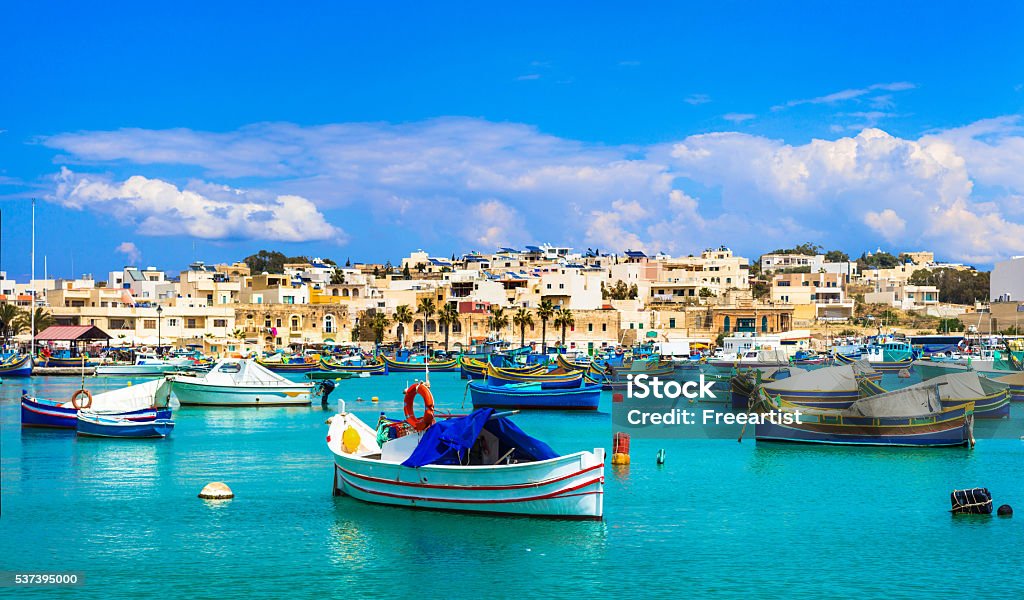 Beautiful Marsaxlokk Village,Malta,Europe. Marsaxlokk Village With Traditional Colorful Fishing Boats Luzzu,Malta. Adulation Stock Photo