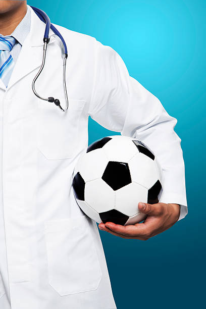Doctor With Soccer Ball Stock Photo - Download Image Now - Soccer