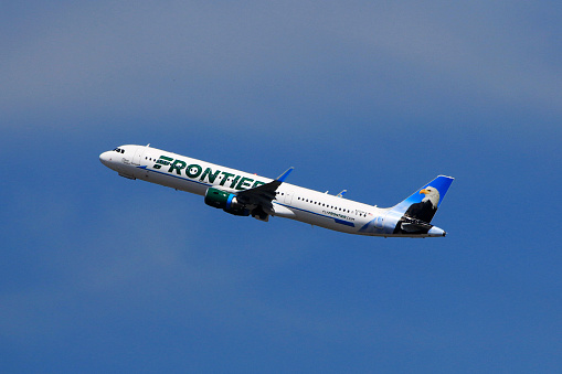 Charlotte, NC, USA - May 28, 2016: Frontier Airlines A321 (Registration No. N709FR) taking off at Charlotte Douglas International Airport.