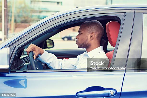 Young Man Driving His New Car Stock Photo - Download Image Now - Car, African Ethnicity, Driving