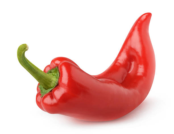 Isolated red bell pepper Isolated bell pepper. One curved red capsicum pepper isolated on white background with clipping path red bell pepper stock pictures, royalty-free photos & images