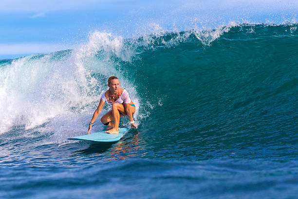 istock Surfer girl on Amazing Blue Wave 537400151
