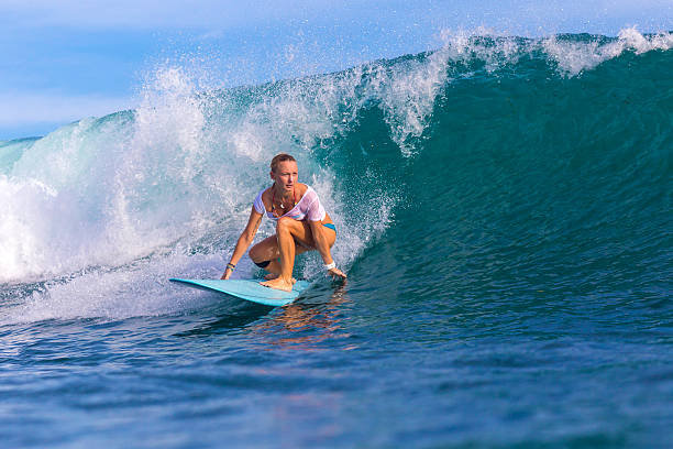 istock Surfer girl on Amazing Blue Wave 537400157