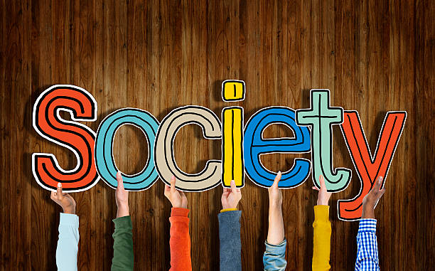 Multiethnic Group of Hands Holding Word Society