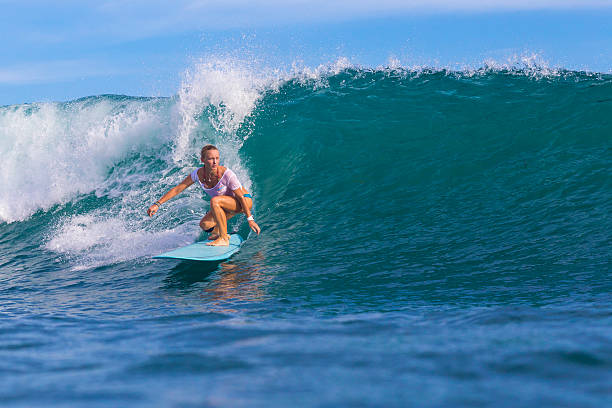 istock Surfer girl on Amazing Blue Wave 537400683