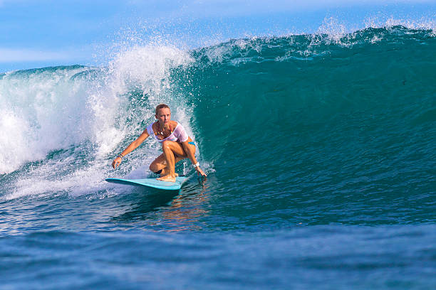 istock Surfer girl on Amazing Blue Wave 537400701