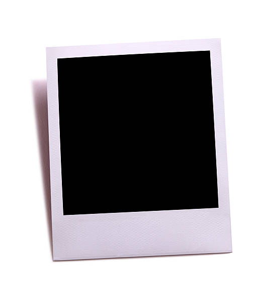 istock Blank instant camera photo print isolated on white. 537401221