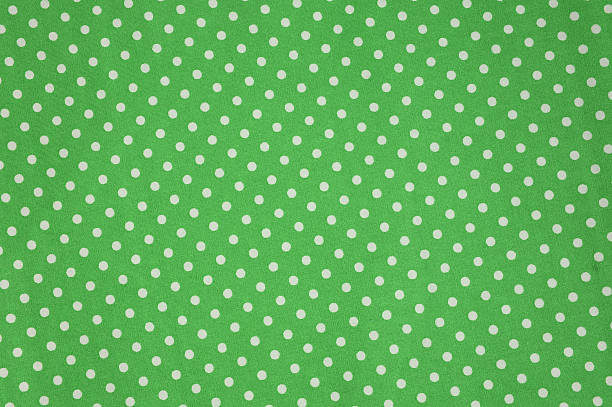istock Seamless polka dots fabric for background 537402653