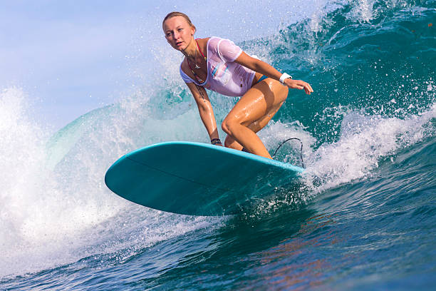 istock Surfer girl on Amazing Blue Wave 537402745