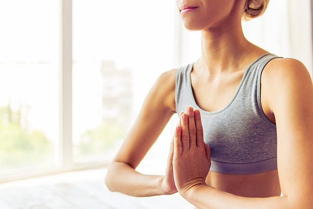 istock Beautiful girl doing yoga 537404406
