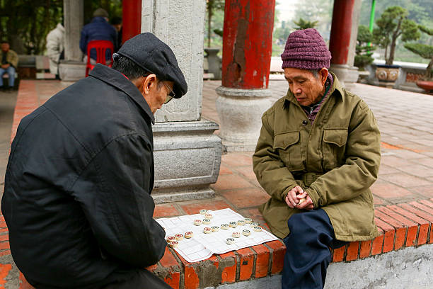 Men playing chess in Hanoi stock photo