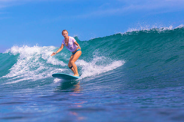 istock Surfer girl on Amazing Blue Wave 537406077