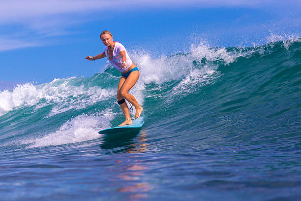 istock Surfer girl on Amazing Blue Wave 537406107