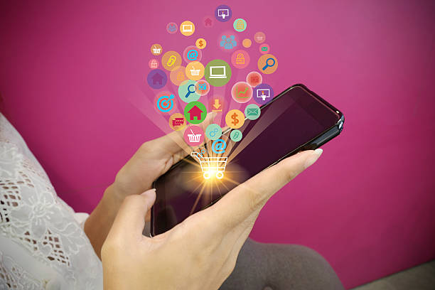 istock shopping cart with application software icons on mobile 537409452