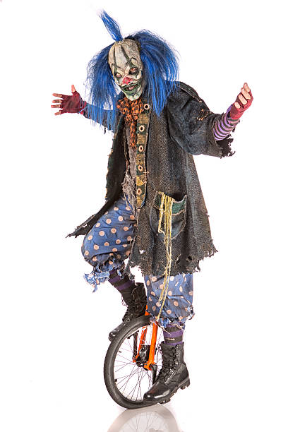 Creepy Clown riding unicycle
