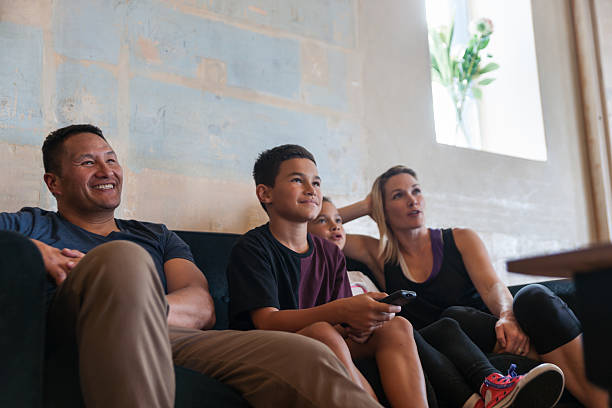 istock Family sitting together in lounge 537412328