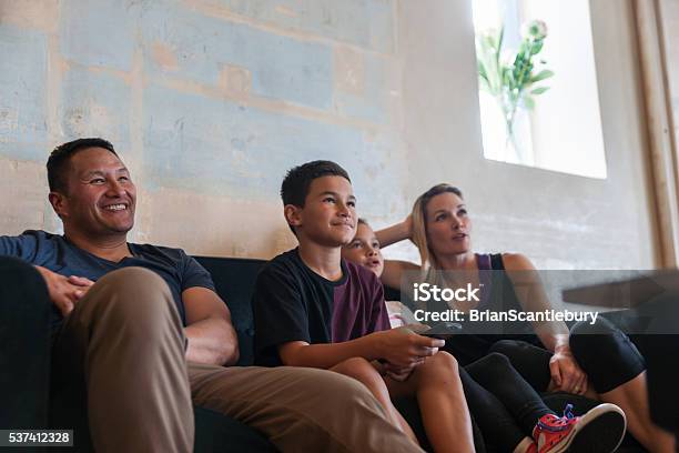 Family Sitting Together In Lounge Stock Photo - Download Image Now - Family, Māori People, Polynesian Ethnicity