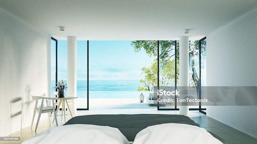 Moderna camera da letto-Terrazza solarium con vista mare - Foto stock royalty-free di Camera d'albergo