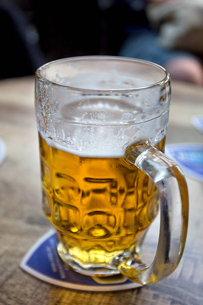 istock Glass of beer placed on table 537414556