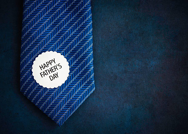 Tie on chalkboard with message for dad. Happy Father's Day