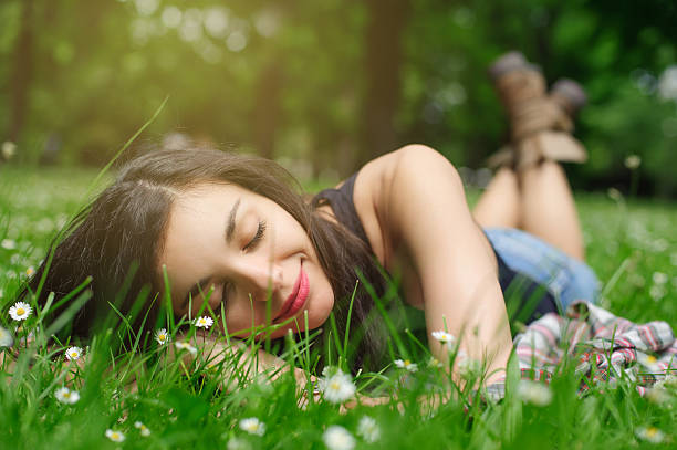 istock Girl resting in meadow 537415602