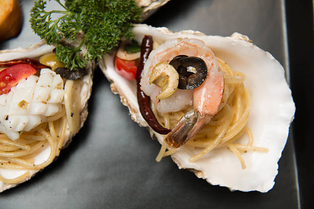 istock pasta delicious spaghetti seafood in shell 537416400