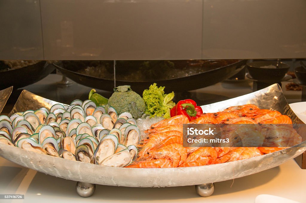 seafood on crushed ice, close-up. A seafood on crushed ice, close-up. Backgrounds Stock Photo