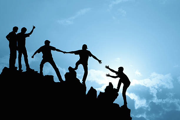 Group of people on peak mountain