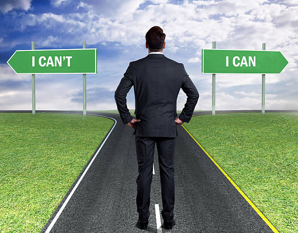istock Businessman with two choices - I Can't or I Can 537421248