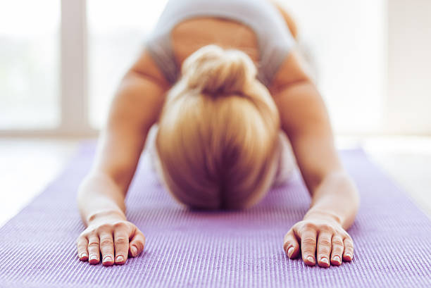 istock Beautiful girl doing yoga 537423524