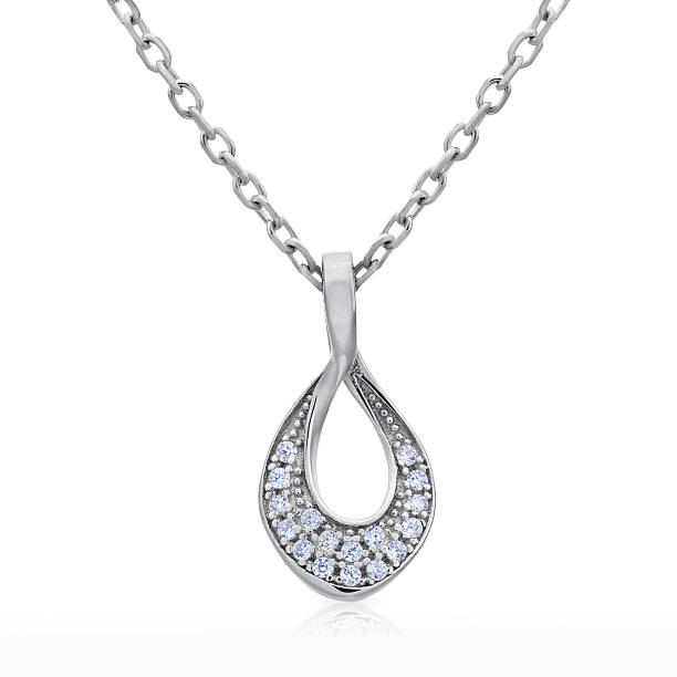 istock Close-up silver pendant with a diamonds on a chain 537424202