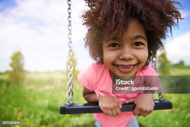 Little Girl On The Playground Stock Photo - Download Image Now - Child, Summer, Swing - Play Equipment