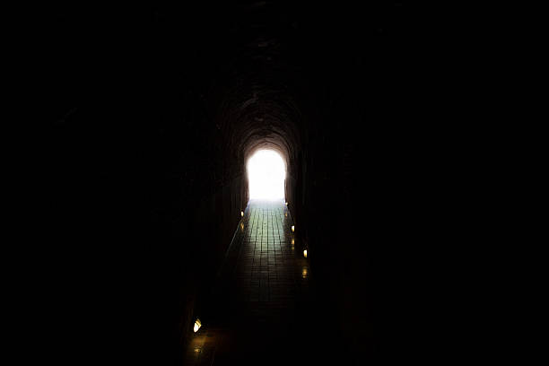 istock light at the end of cave tunnel 537424482
