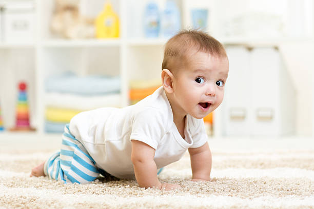 istock crawling baby boy indoors 537425218