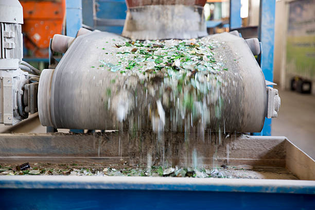 istock Glass waste in recycling facility. Glass particles 537431392