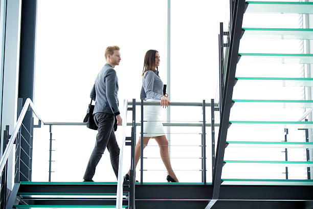 istock Business people climbing a stairway. 537433124