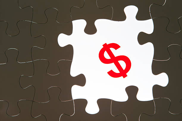 istock US dollar currency symbol and puzzle piece 537433272