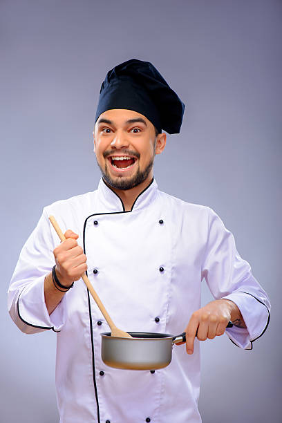 istock Portrait of young handsome cook 537433367