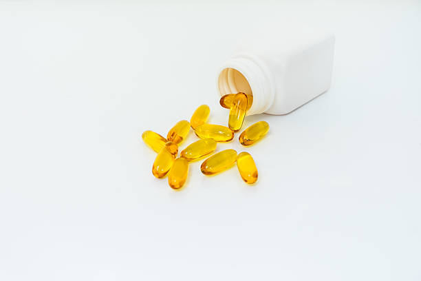 istock yellow medicine and white bottle 537433715