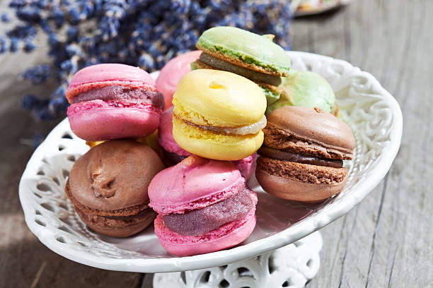 istock Colorful macarons on bowl and lavender 537434153