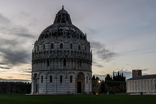 Pisa cathedral and leaning tower at dusk